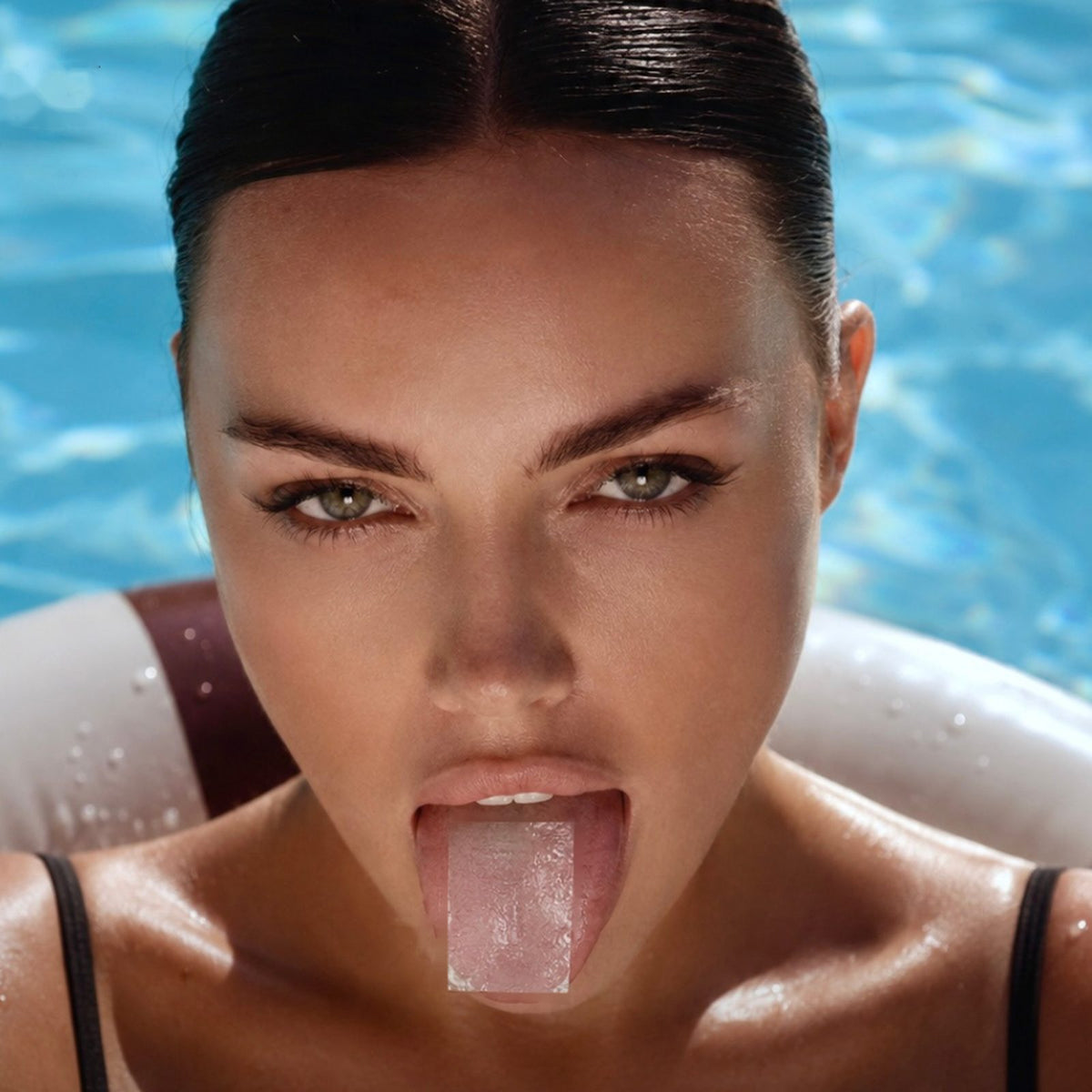 Smart Strips IMMUNE oral dissolvable strips, woman in a pool with a strip on her tongue